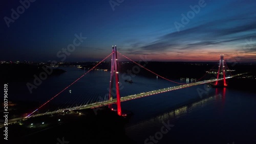 Yavuz Sultan Selim Bridge in Istanbul, Turkey. Aerial view at sunset with drone. Colorful bridge and weather.