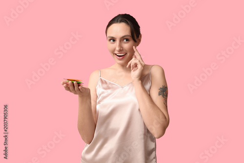 Beautiful young woman with ...