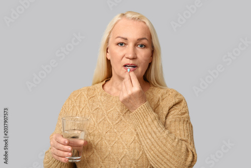 Beautiful mature woman with...