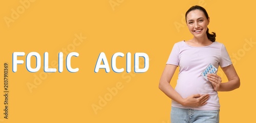 Happy pregnant woman with p...