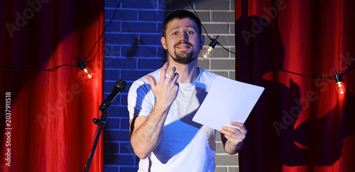 Male actor with film script...
