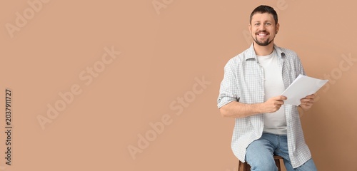 Male actor with movie scrip...