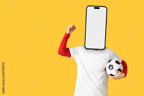 Male sports fan with soccer...
