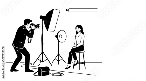 Fotografie Professional photographer taking a studio portrait of a seated woman