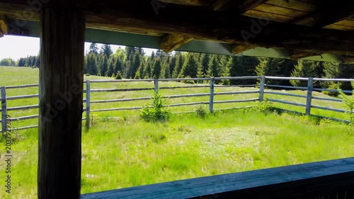 A perfect morning seen from the terrace of a mountain cabin in summer. Escape to the tranquility of the mountains. Looking at nature from the terrace of the mountain cabin