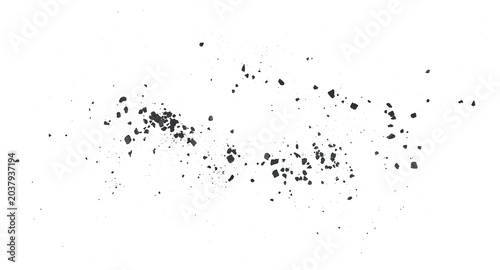 Tableau sur toile Particles of natural wood charcoal on a white background, view from above