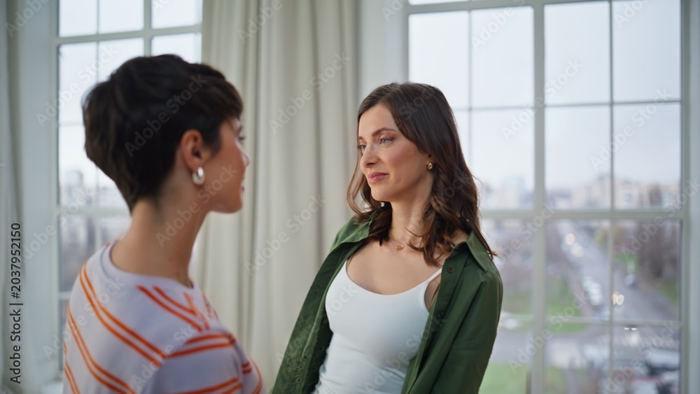 Naklejka premium Romantic girlfriends dancing slowly enjoying relaxed domestic leisure closeup.