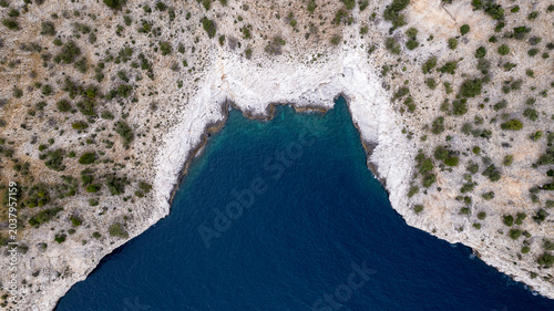 фотографія Aerial view of a turquoise aegean sea bay