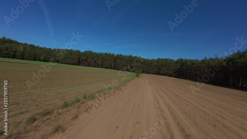 FPV Drone Flight Over Agricultural Fields with Forest Edge