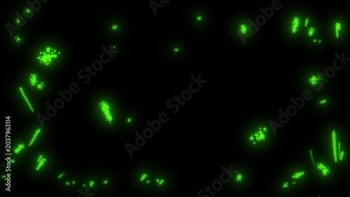 Dynamic green dots with neon glow on a black screen. Stock overlay video with green grain and spots.