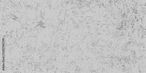 A dark aged grunge metal texture and rough gray concrete wall surface with an antique vintage pattern design on a dirty cement backdrop