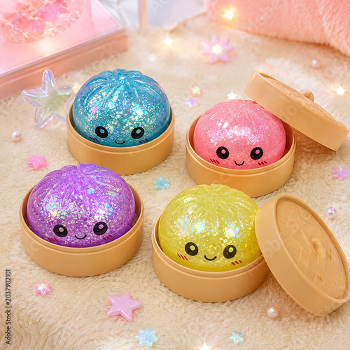 Colorful glitter squishy dumpling toys in bamboo style containers on cozy pastel background with cute decor