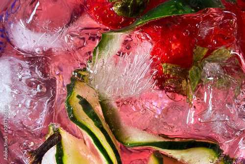 Fresh Detox Pink Drink with Cucumber and Strawberry Slices