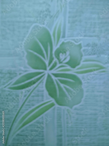 Close up blur image of green orchid flower pattern, Abstract background with soft focus for text space.