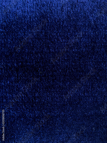 Opulent sapphire blue textile with a soft, dense pile, evoking a sense of refined luxury and depth