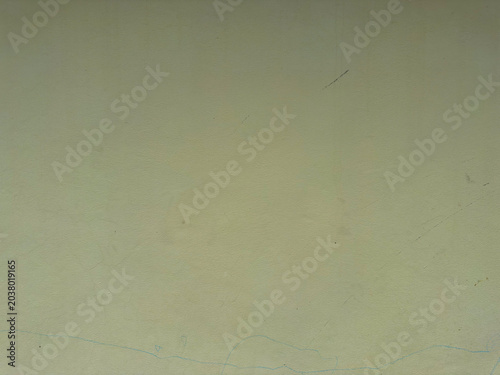 Subtle aged plaster texture with delicate cracks and muted earthy tones providing a serene