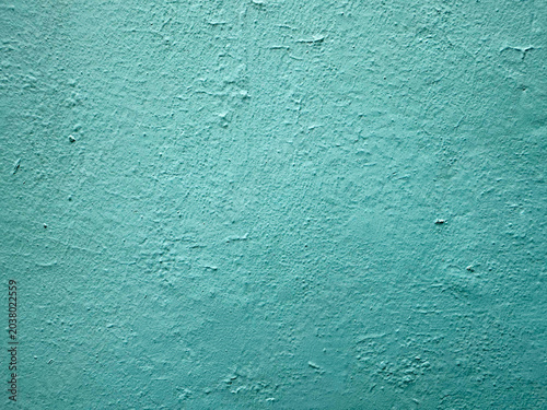 Slika na platnu Vibrant seafoam green wall surface revealing a myriad of tactile undulations and