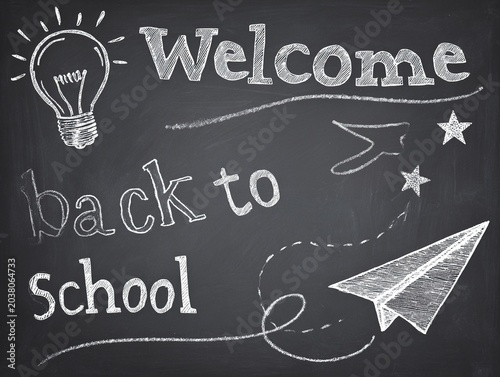 Chalkboard Background with White Chalk: Welcome, Star, Lightbulb, and Bold Back to School