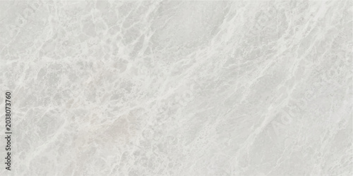 Photos Close-up shot of a white marble surface with intricate, light grey veining, showcasing its natural texture and elegant pattern