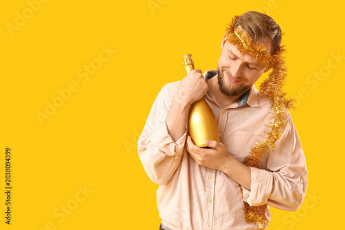 Drunk young man with tinsel...