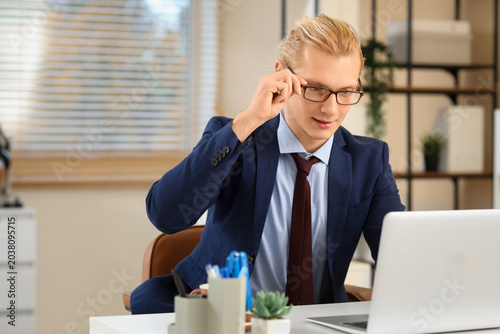 Young businessman working w...
