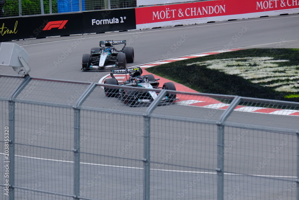 Obraz premium May 25, 2026, Montreal, Canada, Mercedes F1 car driven by Antonelli and Russell during Formula 1 action. g.