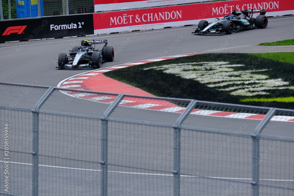 Obraz premium May 25, 2026, Montreal, Canada, Mercedes F1 car driven by Antonelli and Russell during Formula 1 action. g.