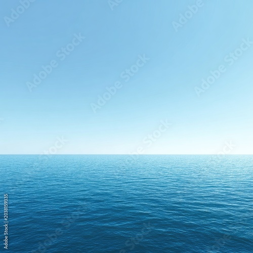 Calm, vast ocean meeting a bright, clear blue sky