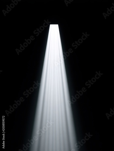 A beam of light illuminated against a dark background, creating a mysterious atmosphere.
