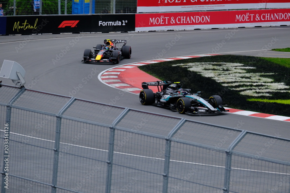 Obraz premium May 25, 2026, Montreal, Canada, Mercedes F1 car driven by Antonelli and Russell during Formula 1 action. g.