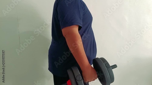 Close Up Overweight Man Performing Dumbbell Hammer Curl