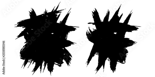 Photos Two abstract black ink brush stroke splatters create a striking, dynamic composition with spiky edges