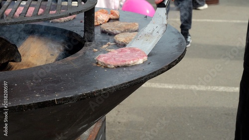 Konstfotografi Street food cookout scene, Urban outdoor grilling with sizzling patties, Closeup