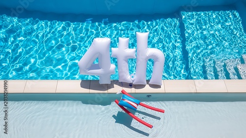 Fourth of july pool party floating balloon concept
