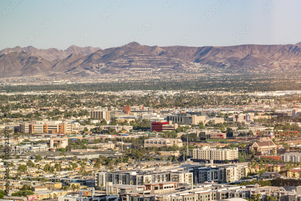 Fototapeta premium In the distance are MacDonald Highlands (Henderson) and Black Mountain (McCullough Range).Las Vegas Valley, Clark County, Nevada.Basin and Range Province, Mojave Desert. from Encore Las Vegas 