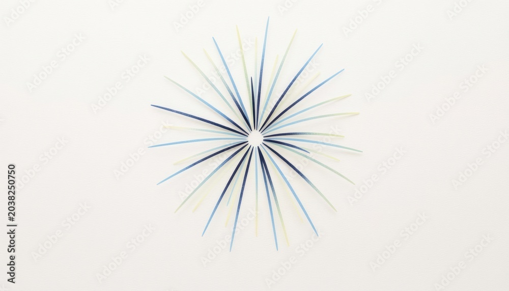 Obraz premium Blue and yellow firework burst element on white background with copy space for new year designs, celebration greeting cards and minimal festive holiday templates