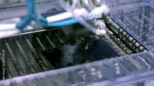 Mobile Phone Touch Monitor Production Line.
Shots sequence of manufacturing production line of touch panel monitor screen for mobile phone.
