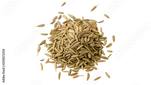 Fotografie Heap pile of organic dry cumin seeds aromatic cooking spice on transparent backg
