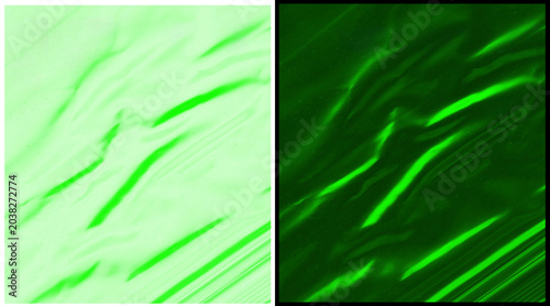 Obraz na płótnie Abstract green fabric texture background, flowing emerald silk ripples, soft lim