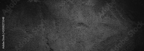 Schilderij op canvas Dark grey stone texture with a rough, grainy surface, ideal for backgrounds, architectural design projects, or natural texture concepts