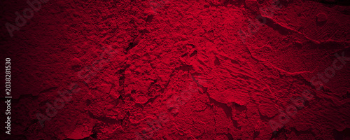 Photos Dark red rough textured plaster wall surface perfect for projects needing a gloomy, horror atmosphere with dramatic lighting and shadows