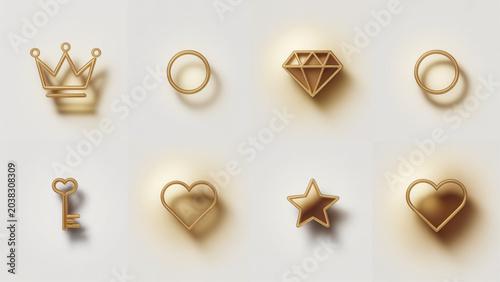 Foto Assorted gold-colored metal jewelry charms on a neutral background Vector