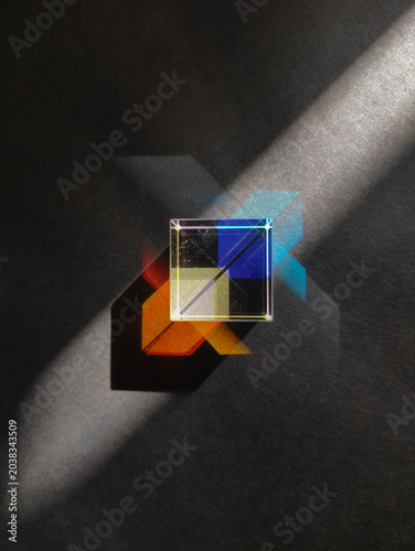 prism,colorful light,Diamond Reflections	,Optical Glass Prism with Light Refraction and Color Dispersion Projecting Vibrant Rainbow Spectrum Light Beams on Dark Black Background