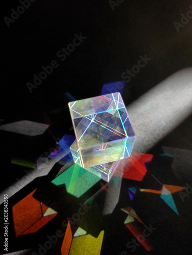 prism,colorful light,Diamond Reflections	,Optical Glass Prism with Light Refraction and Color Dispersion Projecting Vibrant Rainbow Spectrum Light Beams on Dark Black Background