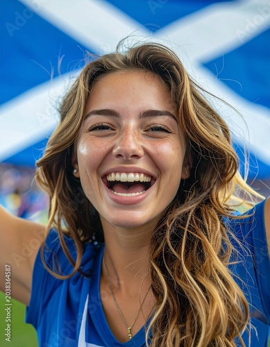 Soccer supporter cheering with flag of Scotland at the World Cup