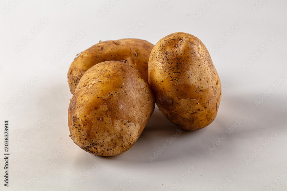 Fototapeta premium Raw potato heap for cooking