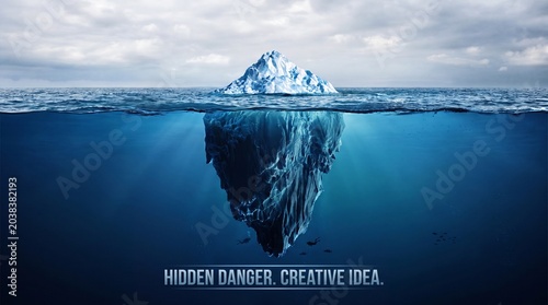 Quadro su tela Beautiful iceberg with a hidden mountain in the sea with a view underwater