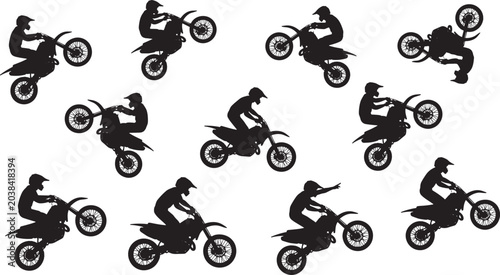 Fotografía Motocross Rider Silhouettes Performing Extreme Motorcycle Stunts and Jumps Isola