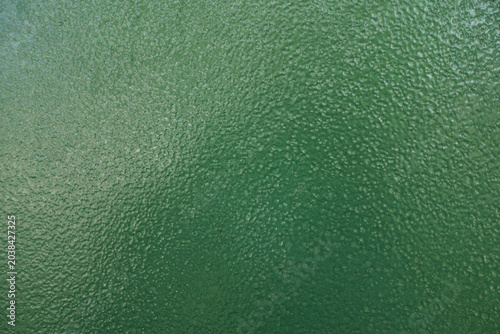 Texture of simple painted green steel plate