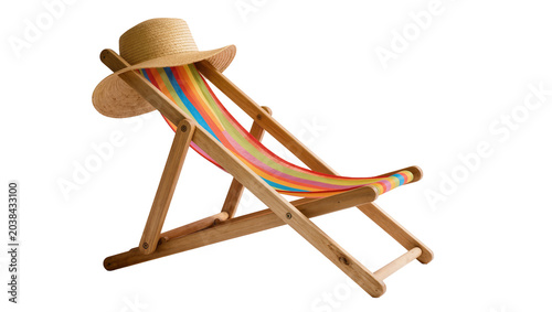 Wooden deck chair with striped fabric and straw hat
